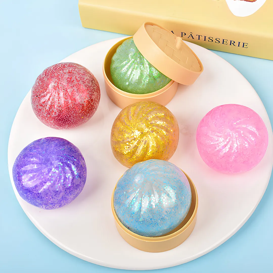 SQUISHY DUMPLING CON GLITTER ANTI ESTRÉS | JUGUETE SENSORIAL RELAJANTE CON ESTUCHE VAPORERA | GADGET DIVERTIDO PARA ALIVIAR LA ANSIEDAD Y LIBERAR TENSIONES